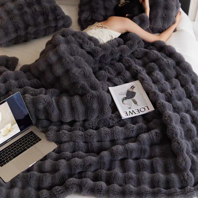Nestique | Kuscheldecke mit zeitloser Wärme