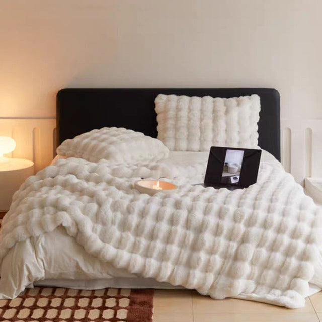 Nestique | Kuscheldecke mit zeitloser Wärme