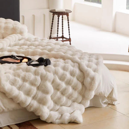 Nestique | Kuscheldecke mit zeitloser Wärme